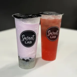 Blended dragonfruit with honey boba and lychee jellies... Dragonfruit tea with popping boba, both were really good!