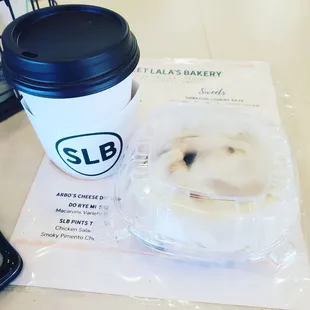 a cup of coffee and a pastry