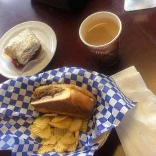 Cubanos sandwich, coffee with milk, no sugar and one sweet cake.. yum