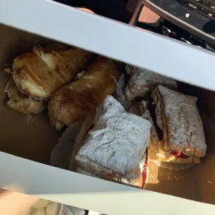 a box of pastries in a car