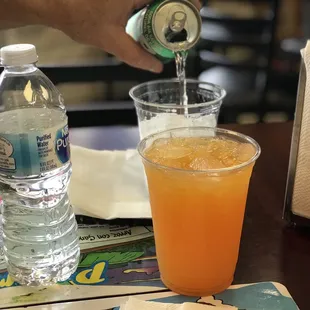 Parcha juice (passion fruit) in forefront  Coconut soda in rear