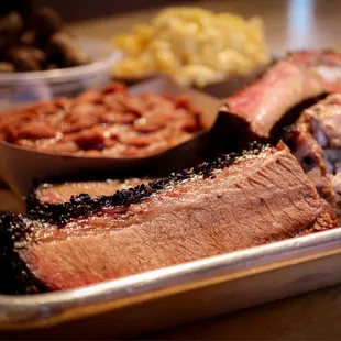 a tray of meat and beans