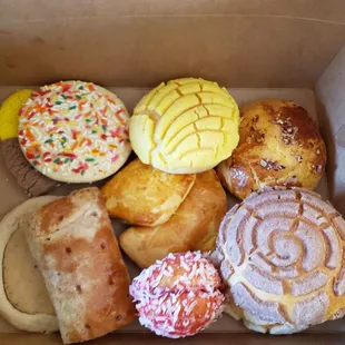 a variety of pastries in a box