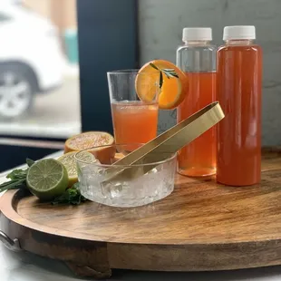 a tray with a drink and a sandwich