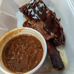 BIG Beef Ribs ... Wasn't that big, beans- good. Will ask for more bbq sauce on the side next time