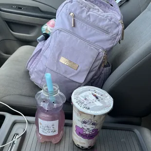 Rose lychee blue tea with lychee jelly and tiramisu jasmine cream puff tea with boba.