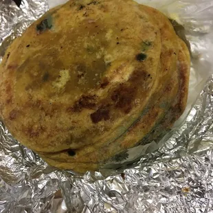 a tortilla wrapped in tin foil