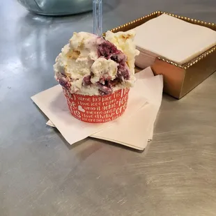 a cupcake sitting on a table