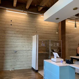 a woman working behind the counter