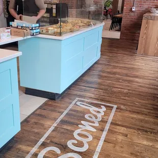 a woman behind the counter