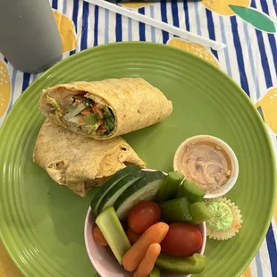 Veggie wrap with hummus and veggies as a side