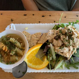 Chicken salad over greens with chicken soup