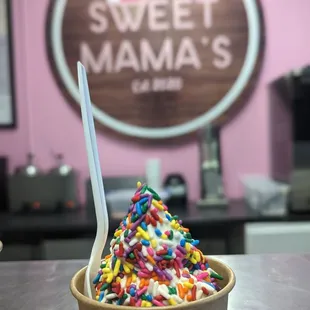 Vanilla soft serve ice cream with sprinkles