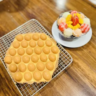 Egg waffle and mixed fruit with grass jelly