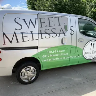 a van parked in a driveway