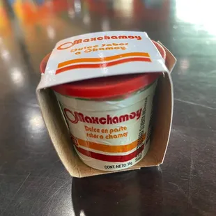 a cup of ice cream on a table