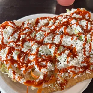 Stole a bite out of this delicious fresh chicharron preparado.