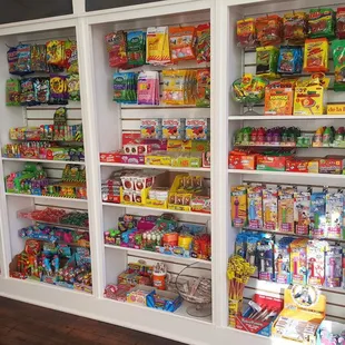 Vast retail shop shelves filled with assorted sweets (11/16/22)