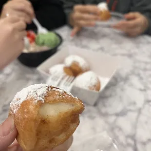 Fried mochi. Eat it along with ice cream and fruits, yummy!