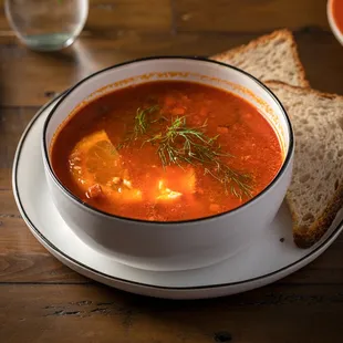 a bowl of soup and bread