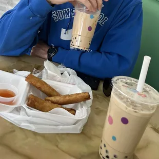 Fried Egg Rolls, Banana Milk Tea with Boba, Brown sugar Milk Tea with Boba.