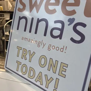 a sign that says, try one today