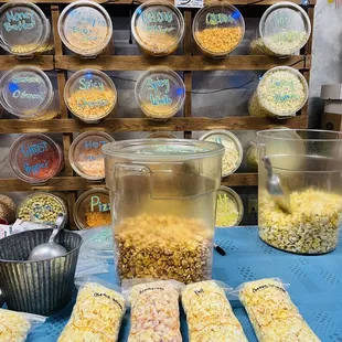 a display of popcorn and other snacks