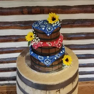 Cowboy wedding  cake at the Hudson Gardens Event Center