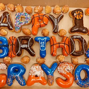 a box of happy birthday donuts