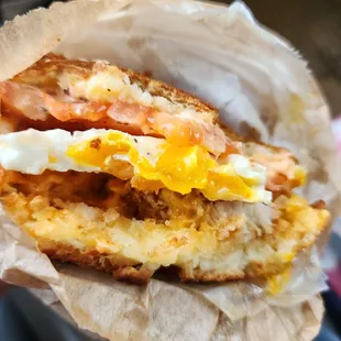 Dripping egg yolk Sriracha katsu chicken egg sandwich heated
