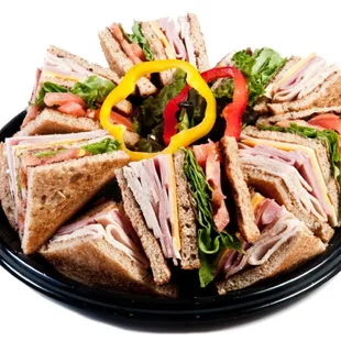 a platter of sandwiches
