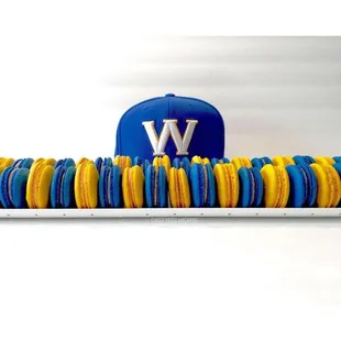 a blue and yellow hat