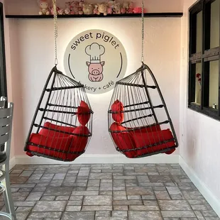Swinging chairs to enjoy the view outside while enjoying your bakery items and coffee