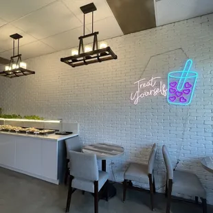 modern interior with live plant above their selection of korean pastries!