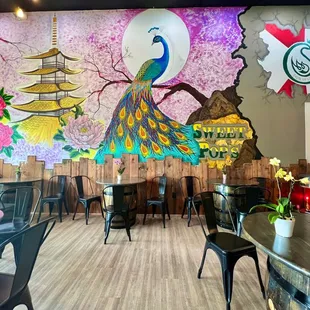 a colorful mural in a restaurant