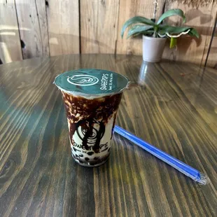 Peppermint milk tea add chocolate syrup and boba