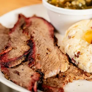 Smoked Brisket with smashed potatoes and collard greens