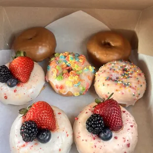 Vegan donuts (maple, vanilla fruity pebbles and sprinkles and lemon)