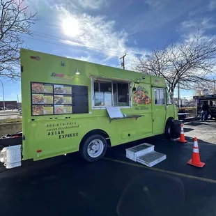 a bright green food truck