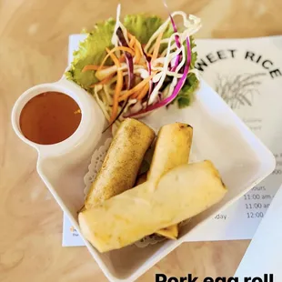 pork egg roll and salad with dipping sauce
