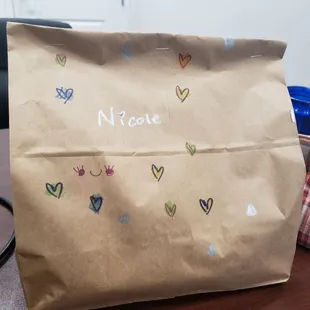 Cute &amp; thoughtful. We've also gotten smiley faces on past orders... something a little extra that goes a long way with a busy work day. :)