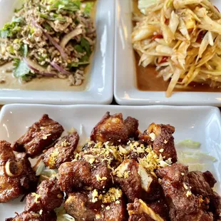 Beef larbs, laos papaya salad and riblets.