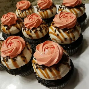 Chocolate Salted Carmel topped with Pink rosettes