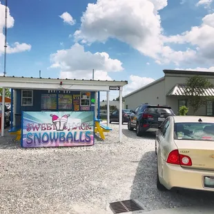 a car parked in front of it