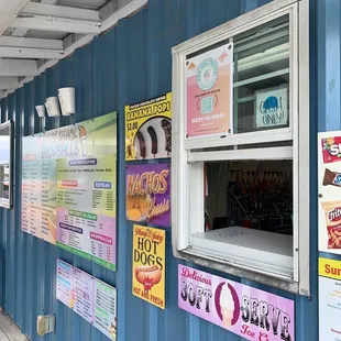 a blue building with signs on it