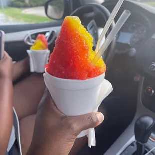 A small strawberry cheesecake and ice cream snowball