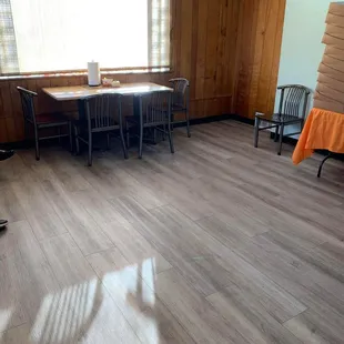 Some tables set up to eat at. Very comfortable home like feeling.