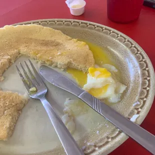 pancake now soaked in egg yolk.