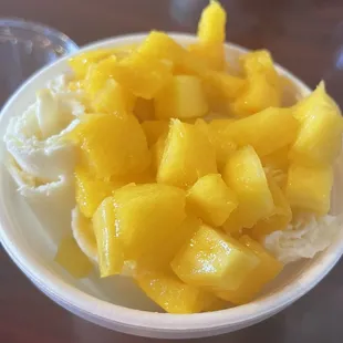 Mango Rolled Ice Cream with fresh mango on top