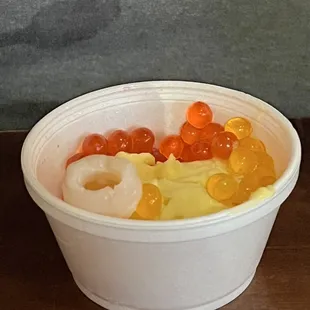 Mango sorbet with strawberry and mango pop and lychee